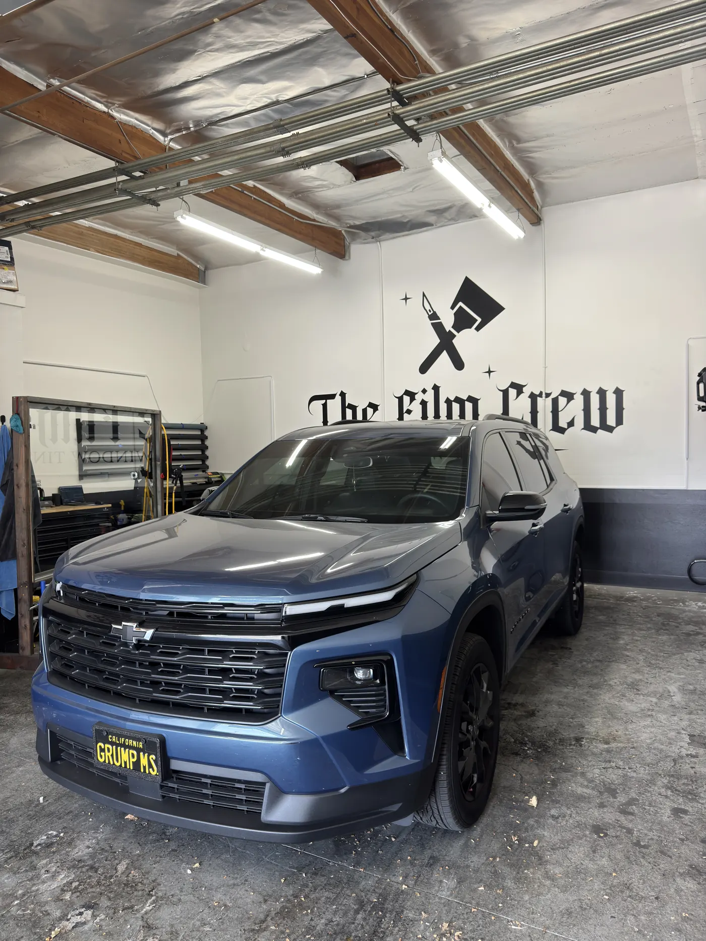 Silver sports car front end at The Film Crew Automotive